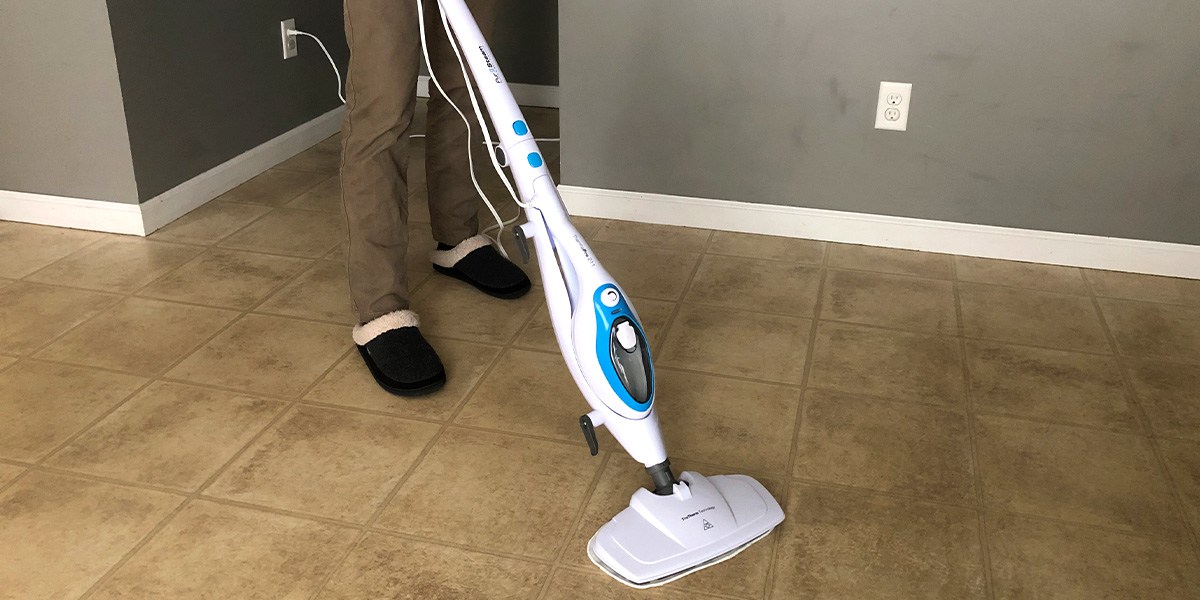 Person cleaning hard floor with PurSteam 10-in-1 Steam Mop