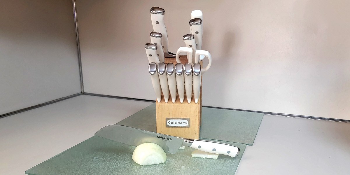 Cuisinart 15-Piece Knife Set with Block on kitchen counter with knife and onion in front Cuisinart 15-Piece Knife Set with Block on kitchen counter with knife and onion in front