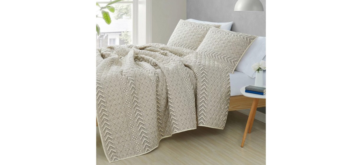 Wade Logan King Quilt + 2 King Shams Wargo Quilt Set on bed in bedroom