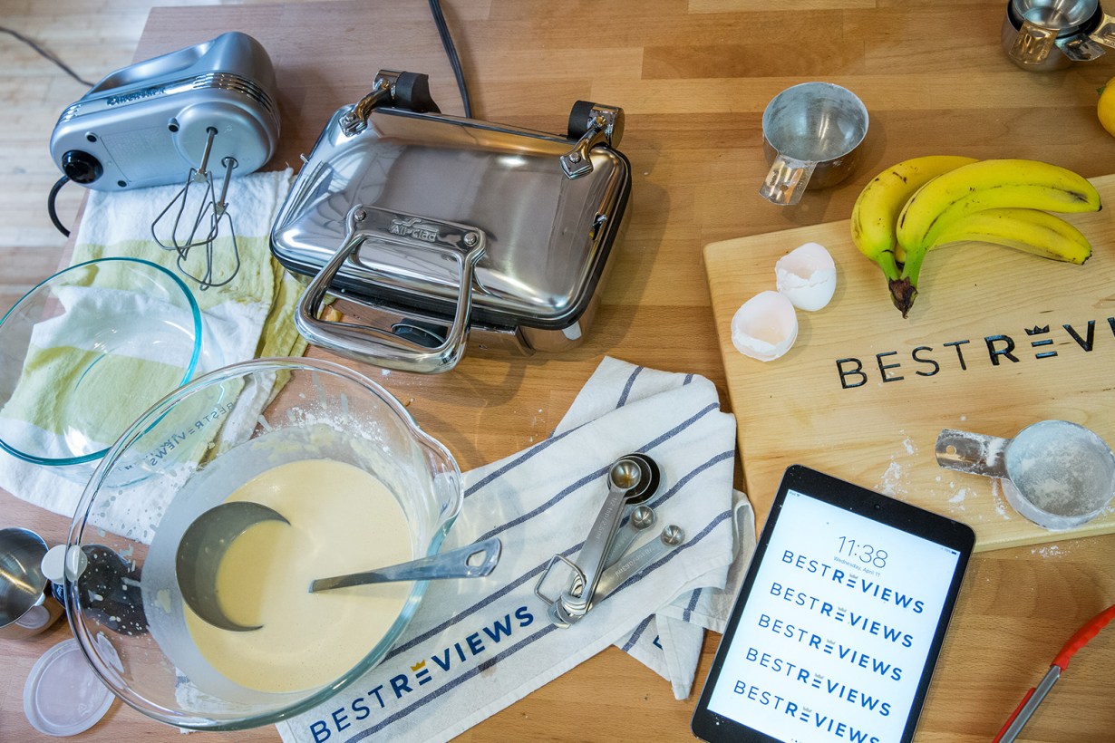 waffle maker and batter on the counter