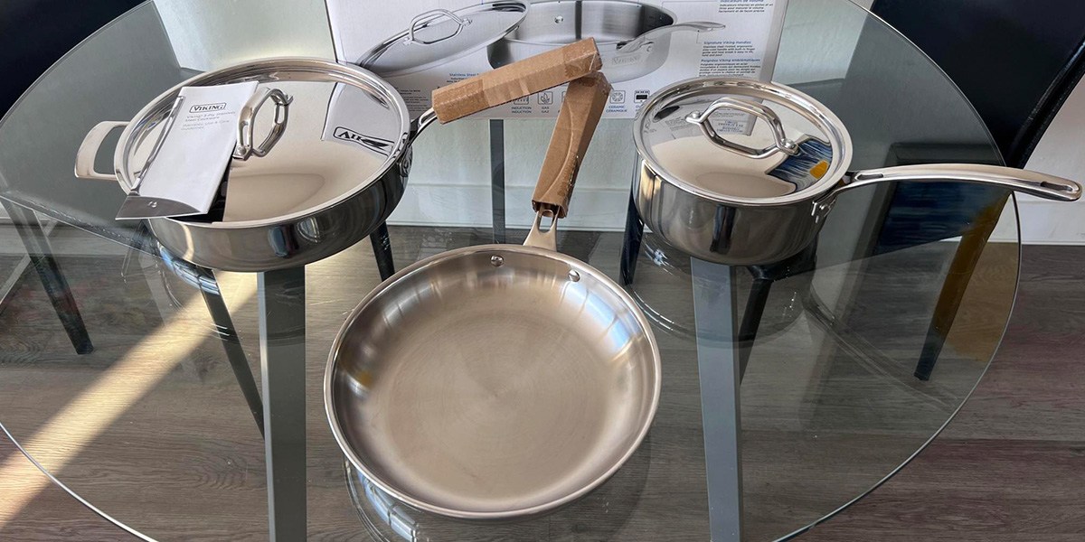 Top view of Viking Culinary 3-Ply Stainless Steel Cookware Set on glass table